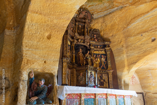 Altar of the rock church of Saints Justo and Pastor, Olleros de Pisuerga, Palencia province, Spain photo