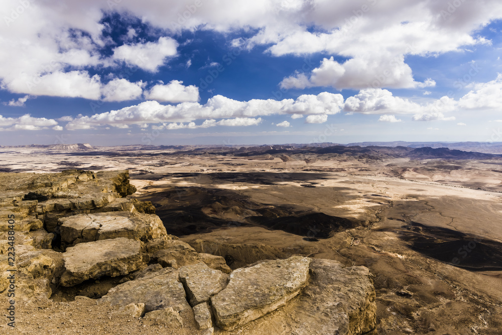 On the cliff of the mountain plateau in the Negev desert On the cliff of the mountain plateau in the Negev desert