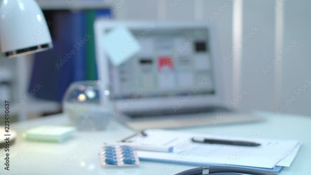 Female hand give thermometer to doctor hand at medical workplace. Close up of woman give hospital thermometer to nurse. Fever thermometer in medical hands. Flu symptom diagnostic Female hand give thermometer to doctor hand at medical workplace. Close up of woman give hospital thermometer to nurse. Fever thermometer in medical hands. Flu symptom diagnostic