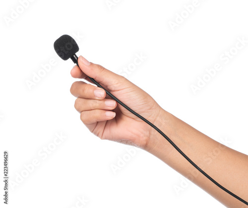 hand holding Microphone lapel or lavalier isolated on white background photo