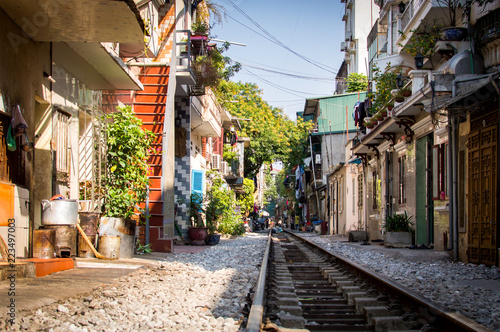 Railroad tracks on a street in the center of Hanoi, Vietnam