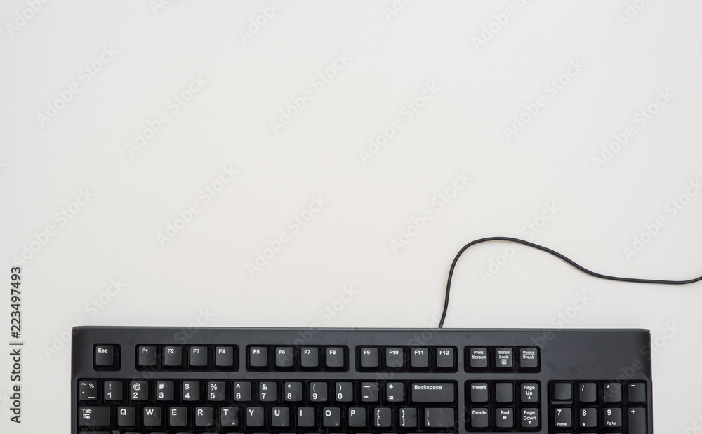Office desk table with keyboard black Top view copy space on white background Office desk table with keyboard black Top view copy space on white background