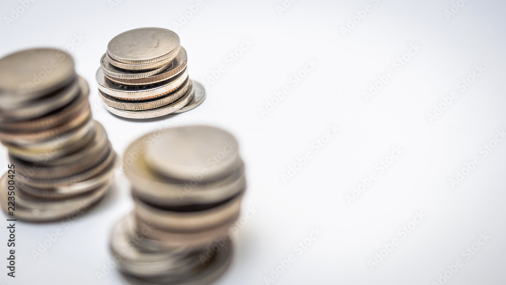 Coin thai bath stacking up selective focus on white background Coin thai bath stacking up selective focus on white background
