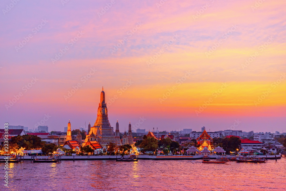 The landscape photo of Wat Arun (The temple of dawn) at twilight time. Wat Arun temple is top tourist destination in Bangkok Thailand