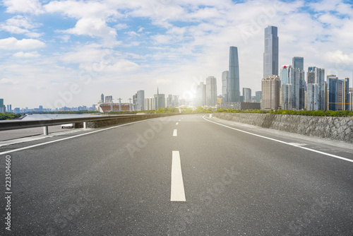 Road pavement and Guangzhou city buildings skyline