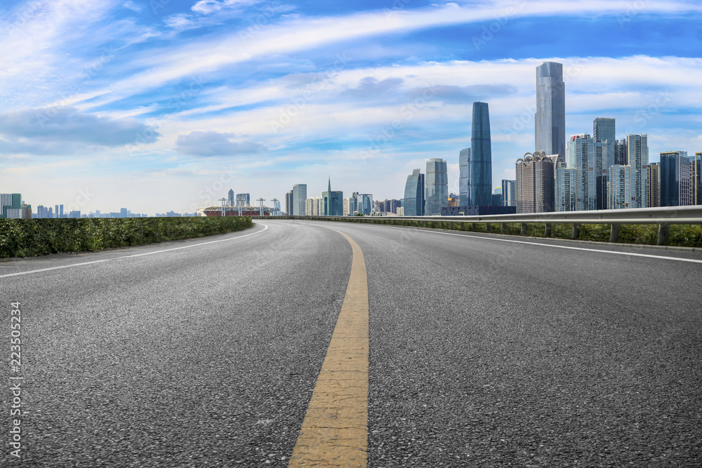 Road pavement and Guangzhou city buildings skyline