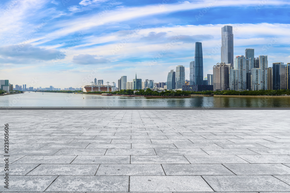 Urban skyscrapers with empty square floor tiles