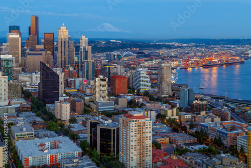Seattle skyline panorama in blue hour with Mt. Rainier in background as seen from Space Needle Tower, Seattle, Washington, USA. Travel USA. photo