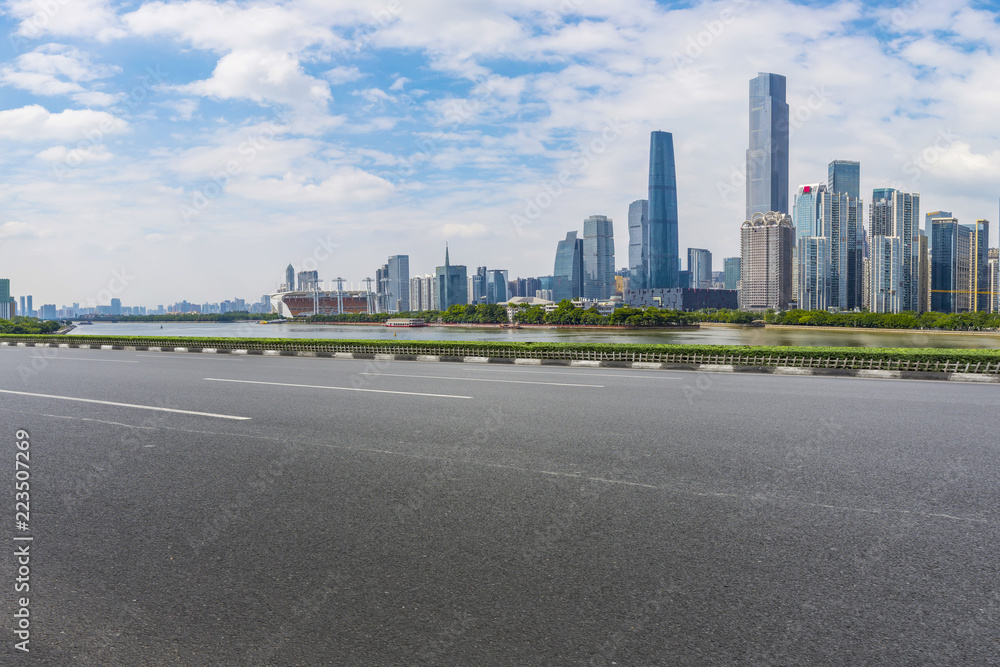 Road pavement and Guangzhou city buildings skyline