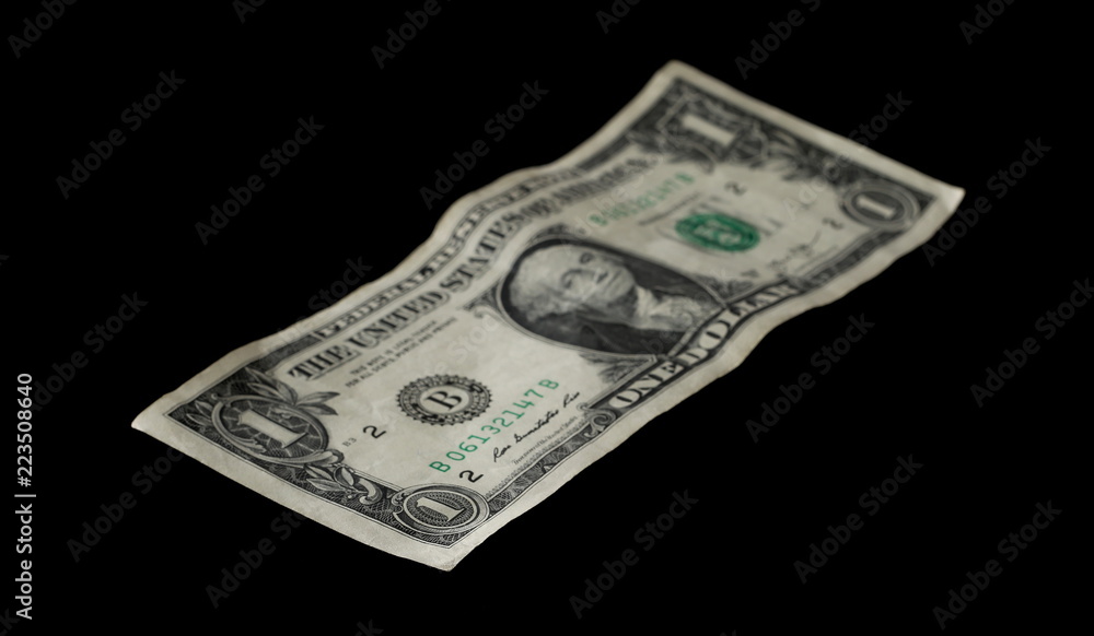 One dollar bill isolated on black background One dollar bill isolated on black background