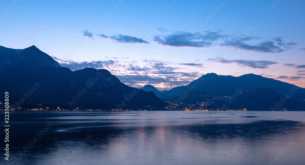 Lake Como with mountains at sunset