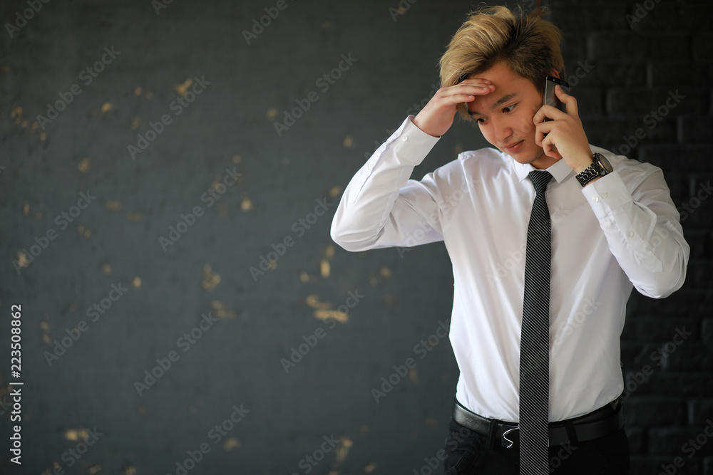 Young Asian businessman in white shirt and tie Young Asian businessman in white shirt and tie
