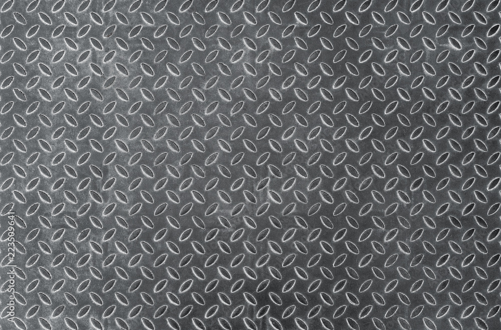 Metal diamond shaped texture, background with copy space Metal diamond shaped texture, background with copy space