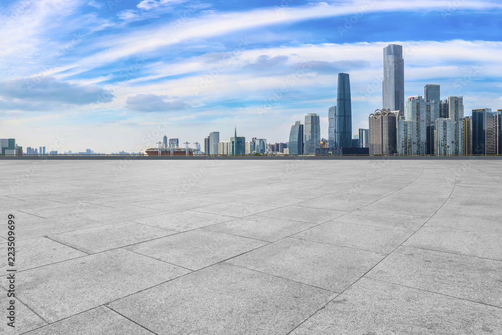 Urban skyscrapers with empty square floor tiles