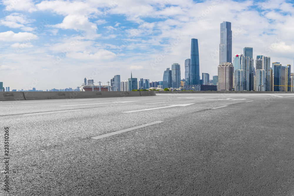 Road pavement and Guangzhou city buildings skyline