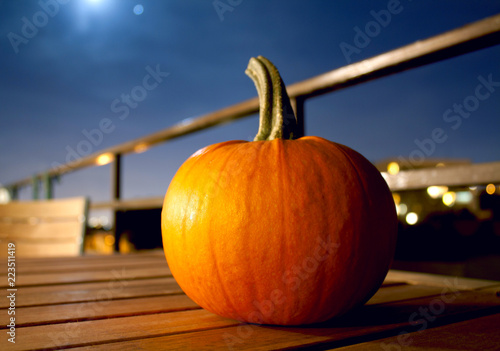 Pumpkin on terrace at moonlight
