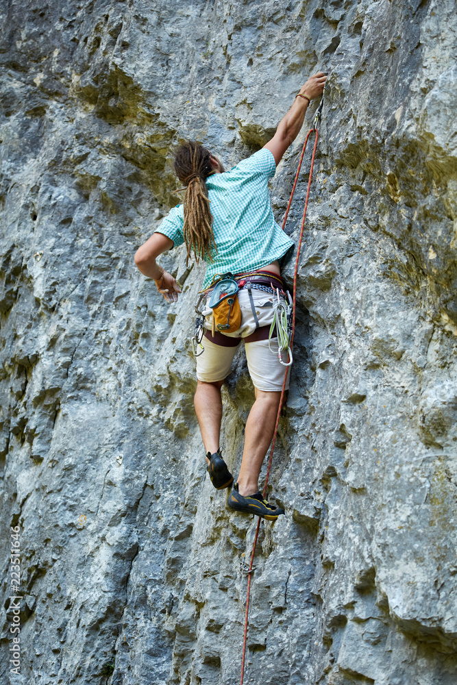 Climber on a wall Climber on a wall