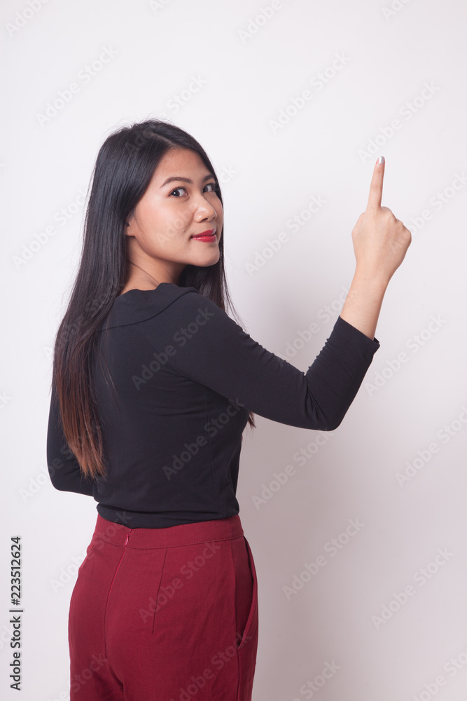 Back of Asian woman touching the screen with her finger. Back of Asian woman touching the screen with her finger.