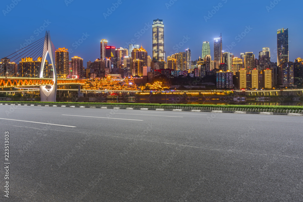 Obraz premium Road pavement and Chongqing urban architecture skyline