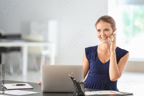 Young businesswoman working...