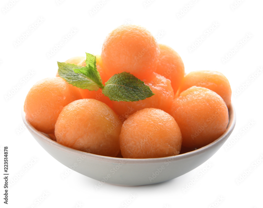 Bowl with delicious melon balls on white background Bowl with delicious melon balls on white background