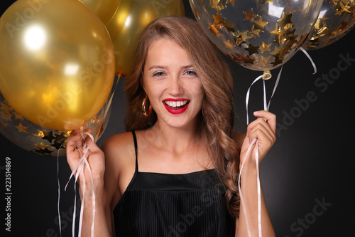 Beautiful young woman with ...