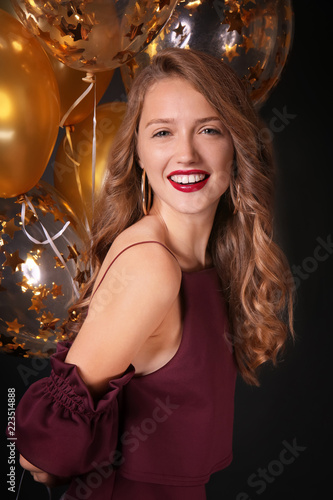 Beautiful young woman with ...
