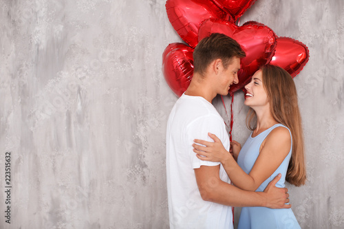 Young couple with heart sha...