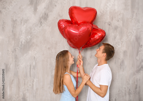 Young couple with heart sha...