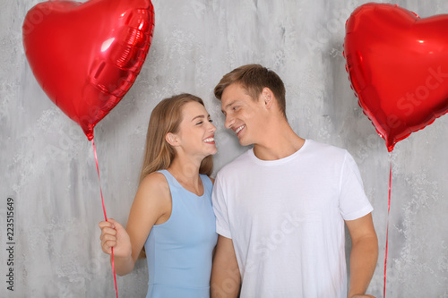 Young couple with heart sha...
