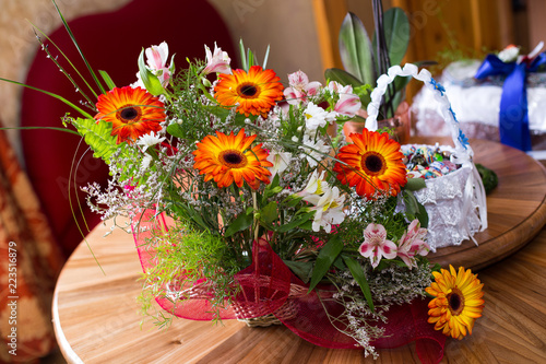 Wallpaper Mural Perfect red bouqet made of autumn flowers. Colorful fall bouquet. Autumn composition of tulips, dry leaves and herbs closeup. Torontodigital.ca