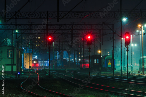 RAYLWAY TRANSPORT - Infrastructure of the railway station at night photo