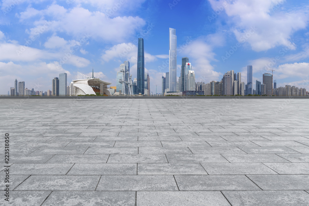 Urban skyscrapers with empty square floor tiles