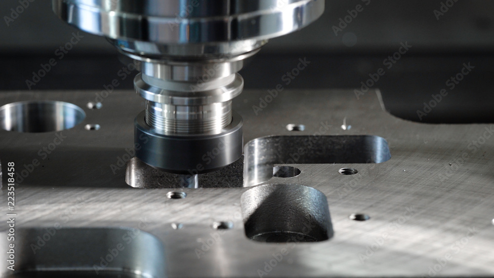 Close-up shot of a milling cutting machine in process. Close-up shot of a milling cutting machine in process.