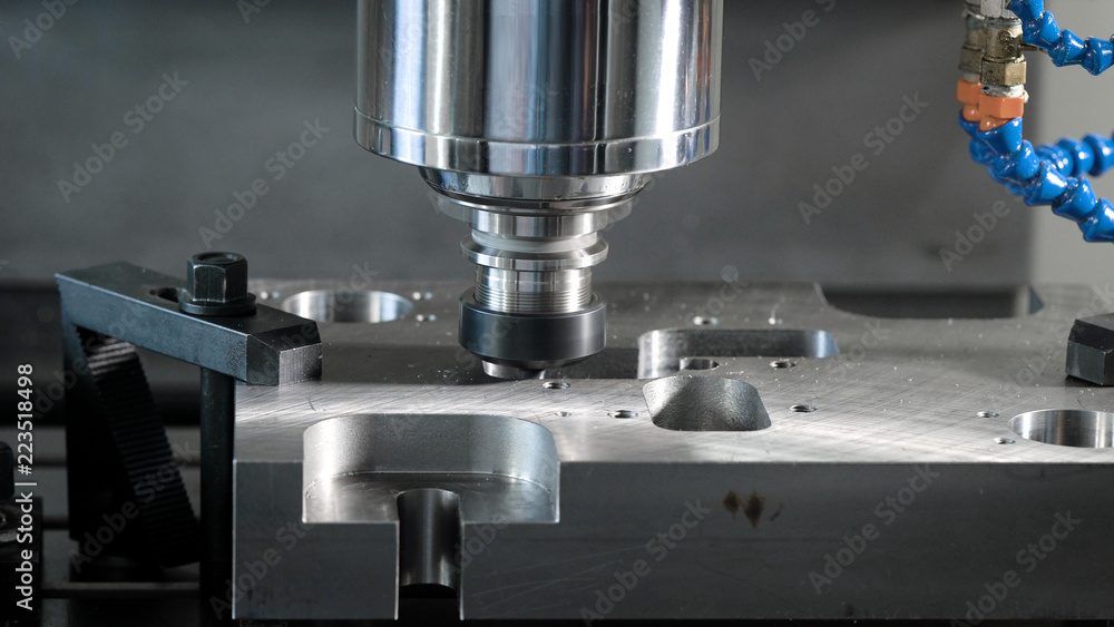 detail is fixed on a moving platform of automatic cutting machine in a shop of factory, close-up of process detail is fixed on a moving platform of automatic cutting machine in a shop of factory, close-up of process