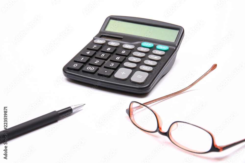 Calculator, glasses and pen on white background Calculator, glasses and pen on white background