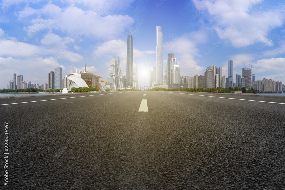 Obraz premium Road pavement and Guangzhou city buildings skyline