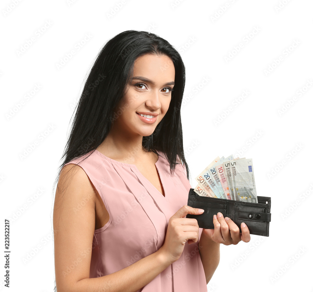 Young woman holding wallet with money on white background Young woman holding wallet with money on white background