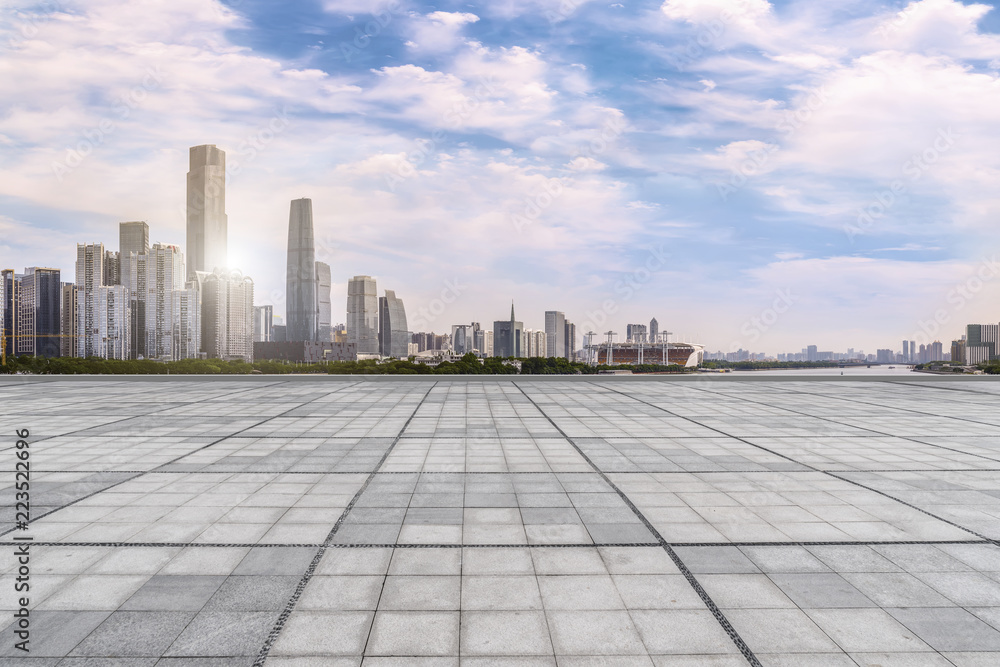 Urban skyscrapers with empty square floor tiles