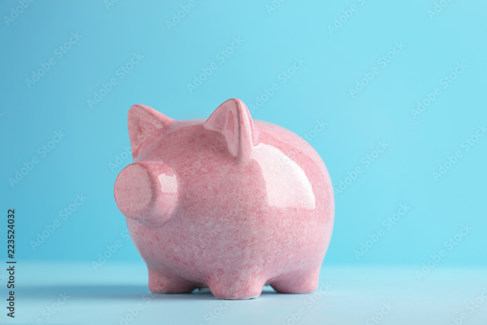 Piggy bank on color background Piggy bank on color background
