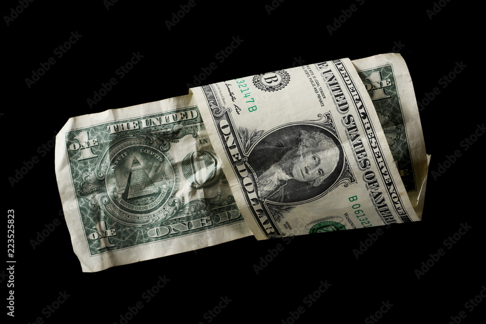 One dollar bill isolated on black background One dollar bill isolated on black background