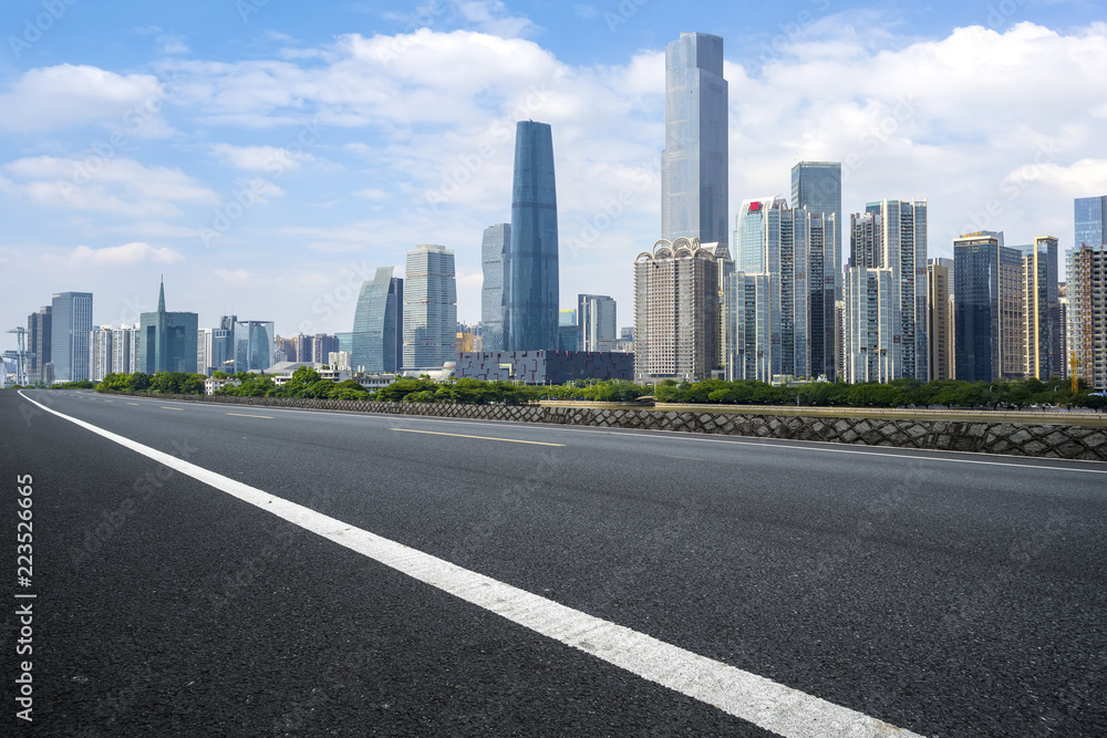 Road pavement and Guangzhou city buildings skyline