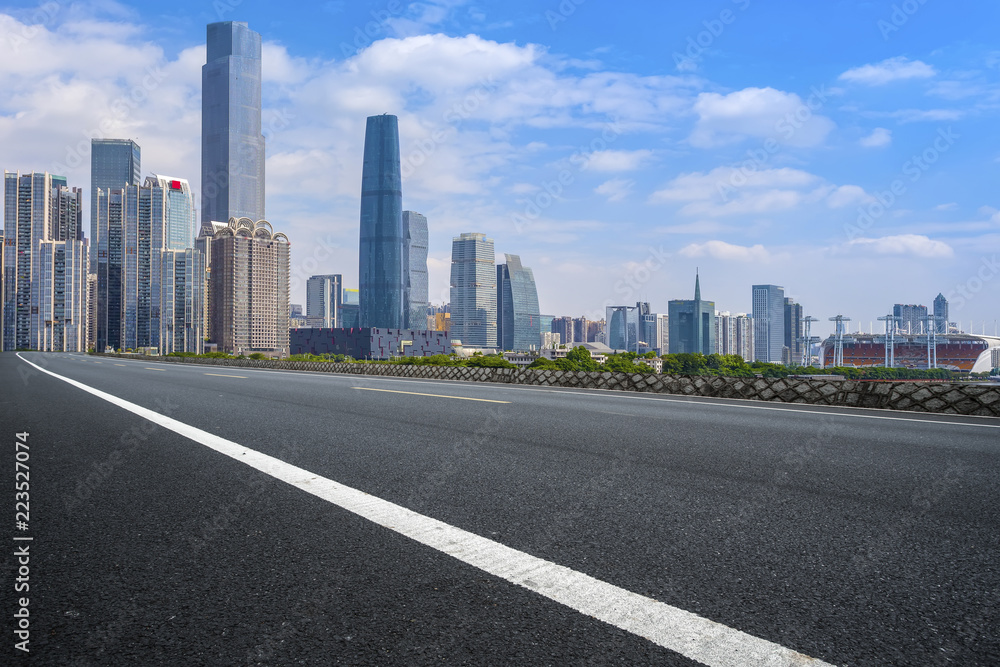 Road pavement and Guangzhou city buildings skyline