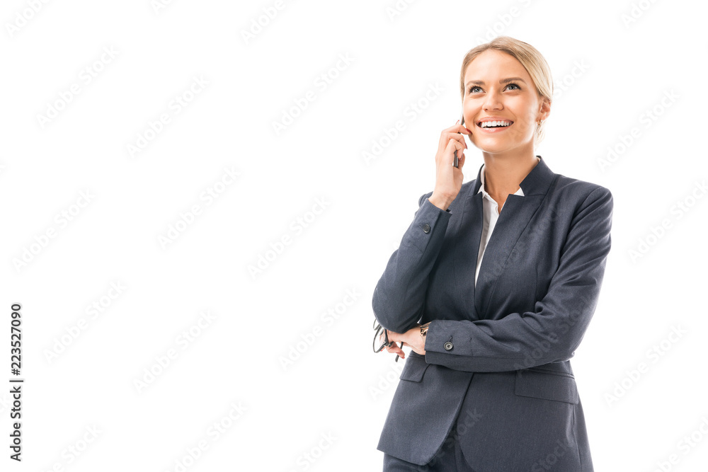 happy young businesswoman talking by phone and looking up isolated on white happy young businesswoman talking by phone and looking up isolated on white