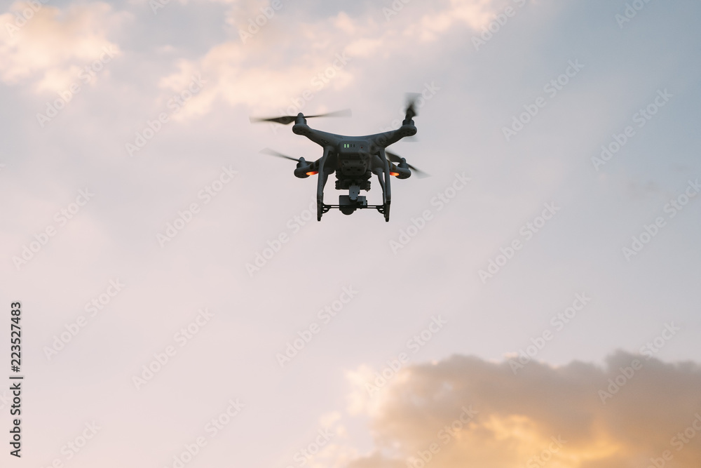 Drone flying in the sunset Drone flying in the sunset