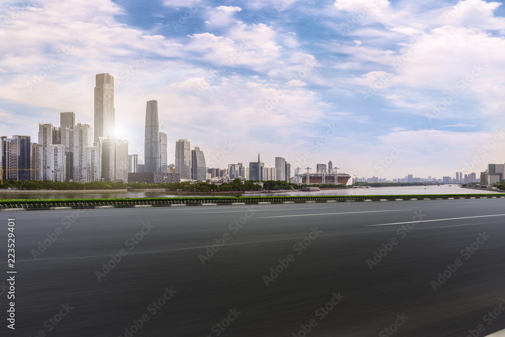 Road pavement and Guangzhou city buildings skyline Road pavement and Guangzhou city buildings skyline