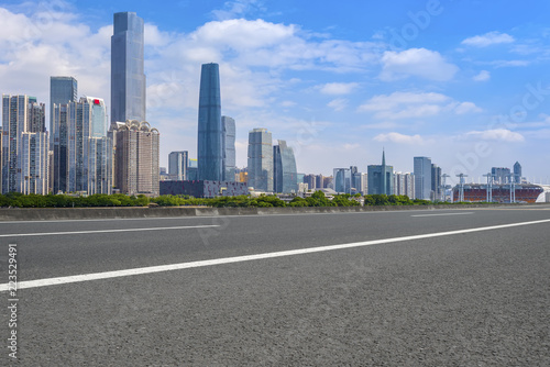 Road pavement and Guangzhou city buildings skyline