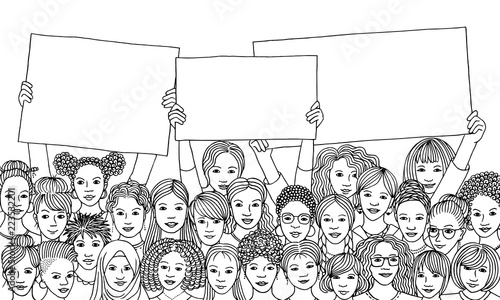 Diverse group of women holding empty signs