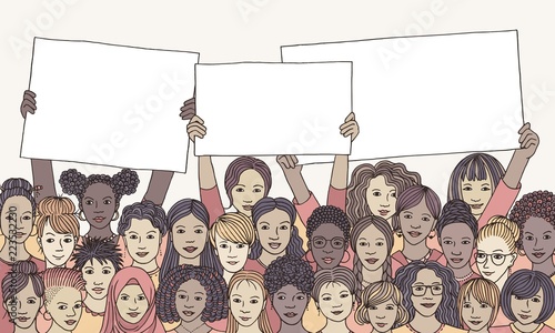 Diverse group of women holding empty signs