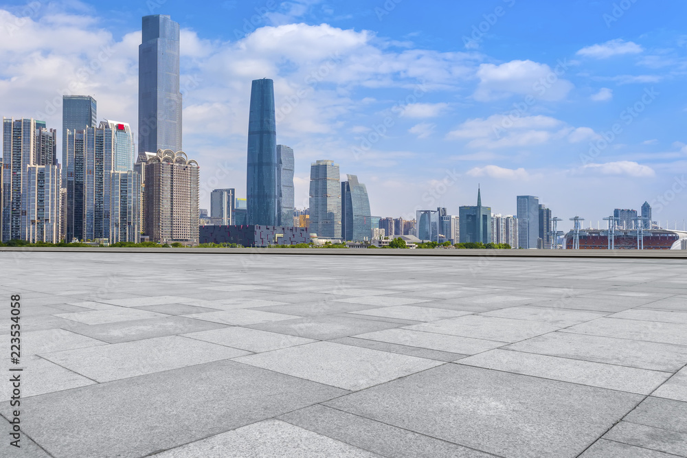 Urban skyscrapers with empty square floor tiles